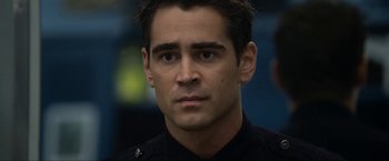 Movie still from “S.W.A.T.” (2003), directed by Clark Johnson – A man in a police uniform looking at the camera; Close Up shot, Over the shoulder angle