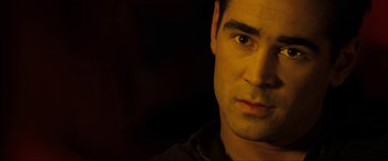 Movie still from “S.W.A.T.” (2003), directed by Clark Johnson – A person with a dark background; Close Up shot, Over the shoulder angle