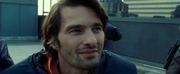 Movie still from “S.W.A.T.” (2003), directed by Clark Johnson – A person wearing a jacket; Close Up shot, Low angle