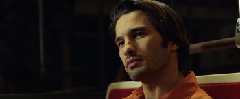 Movie still from “S.W.A.T.” (2003), directed by Clark Johnson – A person with long brown hair; Close Up shot, Low angle