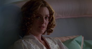Movie still from “Safe” (1995), directed by Todd Haynes – A person with curly hair; Close Up shot, Over the shoulder angle