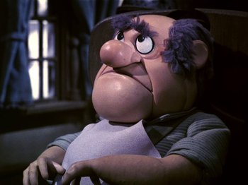 Movie still from “Santa Claus Is Comin' to Town” (1970), directed by Jules Bass – The face of a character; Close Up shot, High angle