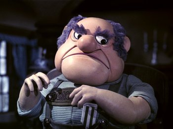 Movie still from “Santa Claus Is Comin' to Town” (1970), directed by Jules Bass – The head of a cartoon character; Close Up shot, Low angle