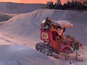 Movie still from “Santa Claus Is Comin' to Town” (1970), directed by Jules Bass – An old toy truck with a character on the back; Extreme Wide shot, High angle