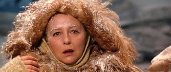 Movie still from “Santa Claus” (1985), directed by Jeannot Szwarc – A person wearing a fur coat; Close Up shot, Low angle
