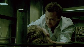 Movie still from “Saw 3D” (2010), directed by Kevin Greutert – A man and a woman are playing with each other; Close Up shot, Over the shoulder angle