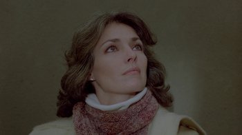 Movie still from “Scanners” (1981), directed by David Cronenberg – A person wearing a scarf; Close Up shot, Low angle
