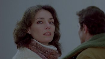 Movie still from “Scanners” (1981), directed by David Cronenberg – A person wearing a scarf; Close Up shot, Over the shoulder angle