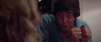 Movie still from “Scarecrow” (1973), directed by Jerry Schatzberg – A person looking at the camera; Close Up shot, Low angle