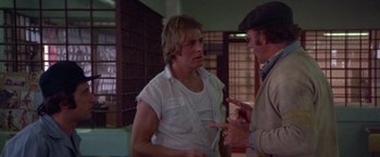 Movie still from “Scarecrow” (1973), directed by Jerry Schatzberg – A man and a woman talking to each other; Medium shot, Over the shoulder angle