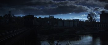 Movie still from “Scarecrow” (1973), directed by Jerry Schatzberg – A view of a river with a dark sky in the background; Extreme Wide shot, Low angle