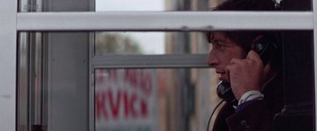 Movie still from “Scarecrow” (1973), directed by Jerry Schatzberg – A man with a microphone in his ear; Close Up shot, Low angle