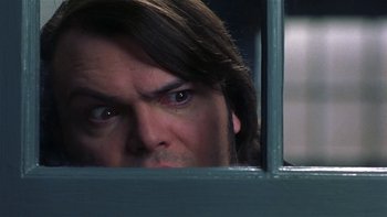 Movie still from “School of Rock” (2003), directed by Richard Linklater – A person looking through a window; Close Up shot, Over the shoulder angle