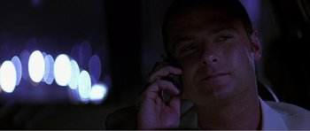 Movie still from “Scream 3” (2000), directed by Wes Craven – A person talking on a cell phone; Close Up shot, Low angle