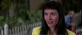 Movie still from “Scream 3” (2000), directed by Wes Craven – A person with long black hair; Close Up shot, Over the shoulder angle