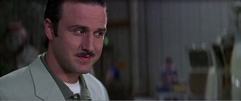 Movie still from “Scream 3” (2000), directed by Wes Craven – A person with a mustache; Close Up shot, Low angle