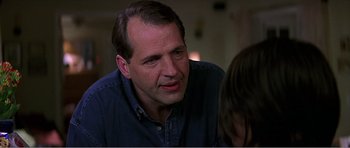 Movie still from “Scream 3” (2000), directed by Wes Craven – A person talking to another person; Close Up shot, Over the shoulder angle