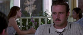 Movie still from “Scream 3” (2000), directed by Wes Craven – A person with a mustache; Close Up shot, Low angle