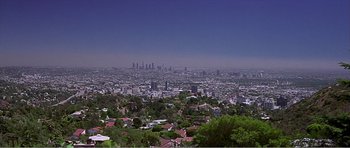Movie still from “Scream 3” (2000), directed by Wes Craven – A view of a large city from a hill; Extreme Wide shot, High angle