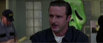 Movie still from “Scream 3” (2000), directed by Wes Craven – A person with a mustache; Close Up shot, Low angle