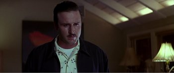 Movie still from “Scream 3” (2000), directed by Wes Craven – A person with a mustache; Close Up shot, Low angle