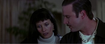 Movie still from “Scream 3” (2000), directed by Wes Craven – A man and a woman looking at one another; Close Up shot, Low angle