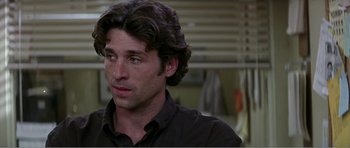 Movie still from “Scream 3” (2000), directed by Wes Craven – A man that is looking at the camera; Close Up shot, Over the shoulder angle