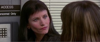Movie still from “Scream 3” (2000), directed by Wes Craven – A person looking at a person; Close Up shot, Over the shoulder angle