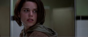 Movie still from “Scream 3” (2000), directed by Wes Craven – A person wearing a hooded jacket; Close Up shot, Low angle
