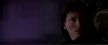 Movie still from “Scream 3” (2000), directed by Wes Craven – A person wearing a black jacket; Close Up shot, Low angle