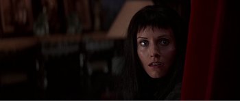 Movie still from “Scream 3” (2000), directed by Wes Craven – A person with long black hair; Close Up shot, Low angle