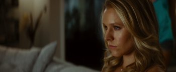 Movie still from “Scream 4” (2011), directed by Wes Craven – A beautiful blonde woman with long hair looking to her left; Close Up shot, Over the shoulder angle