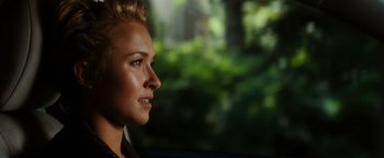 Movie still from “Scream 4” (2011), directed by Wes Craven – A beautiful blond woman looking off into the distance; Close Up shot, Over the shoulder angle