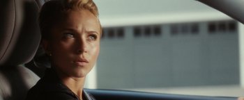 Movie still from “Scream 4” (2011), directed by Wes Craven – A person sitting in a car; Close Up shot, Over the shoulder angle