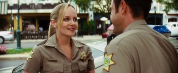 Movie still from “Scream 4” (2011), directed by Wes Craven – A police officer talking to a man in uniform; Close Up shot, Over the shoulder angle