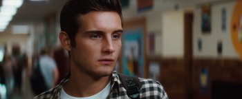 Movie still from “Scream 4” (2011), directed by Wes Craven – A person wearing a plaid shirt; Close Up shot, Over the shoulder angle