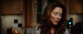 Movie still from “Scream 4” (2011), directed by Wes Craven – A person with long brown hair; Close Up shot, Over the shoulder angle
