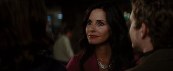 Movie still from “Scream 4” (2011), directed by Wes Craven – A woman that is looking at the camera; Close Up shot, Over the shoulder angle