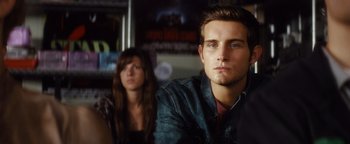 Movie still from “Scream 4” (2011), directed by Wes Craven – A man and a woman sitting next to each other; Close Up shot, Over the shoulder angle