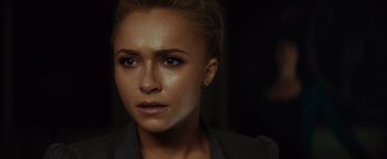 Movie still from “Scream 4” (2011), directed by Wes Craven – A person wearing a jacket; Close Up shot, Over the shoulder angle