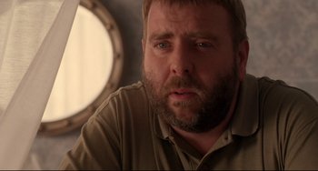 Movie still from “Secrets & Lies” (1996), directed by Mike Leigh – A person with a beard; Close Up shot, Over the shoulder angle