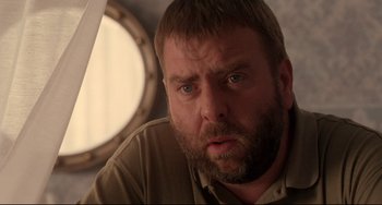 Movie still from “Secrets & Lies” (1996), directed by Mike Leigh – A person with a beard; Close Up shot, Over the shoulder angle