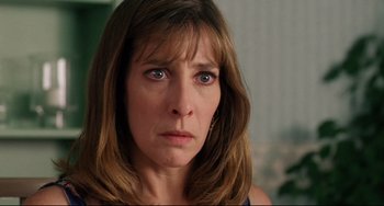 Movie still from “Secrets & Lies” (1996), directed by Mike Leigh – A person with long brown hair; Close Up shot, High angle