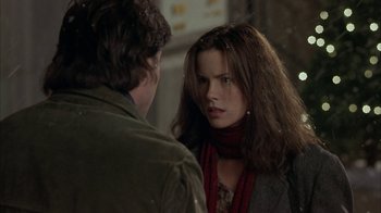 Movie still from “Serendipity” (2001), directed by Peter Chelsom – A man and a woman talking to each other; Close Up shot, Over the shoulder angle