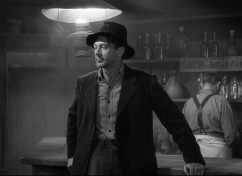 Movie still from “Sergeant York” (1941), directed by Howard Hawks – A black and white photo of a man wearing a hat; Medium shot, Low angle