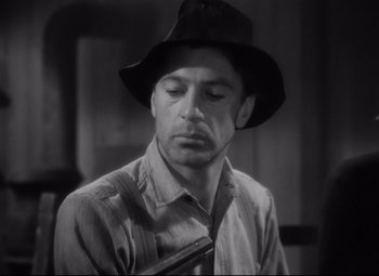 Movie still from “Sergeant York” (1941), directed by Howard Hawks – A black and white photo of a man wearing a hat; Close Up shot, Low angle