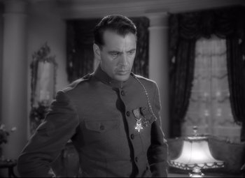 Movie still from “Sergeant York” (1941), directed by Howard Hawks – A black and white photo of a man in a military uniform; Medium shot, Low angle