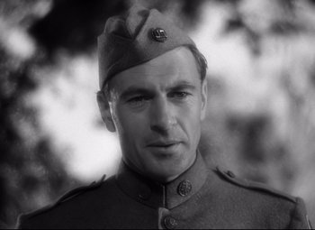 Movie still from “Sergeant York” (1941), directed by Howard Hawks – A man in a military uniform wearing a hat; Close Up shot, Low angle