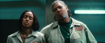 Movie still from “Set It Off” (1996), directed by F. Gary Gray – A couple of men standing next to each other; Close Up shot, Low angle