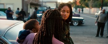 Movie still from “Set It Off” (1996), directed by F. Gary Gray – A woman and a little girl are talking to each other; Close Up shot, Over the shoulder angle